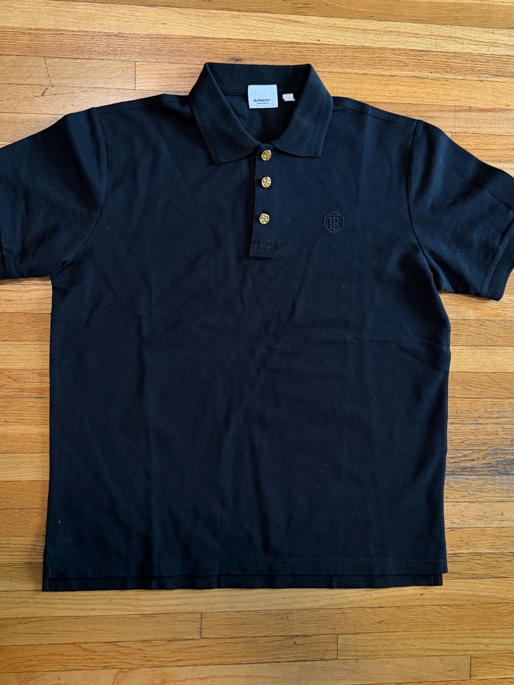 Burberry Black Polo with Gold-Tone Buttons
